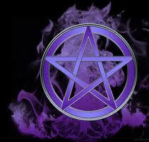 Image of a dragon made of smoke behind a pentacle